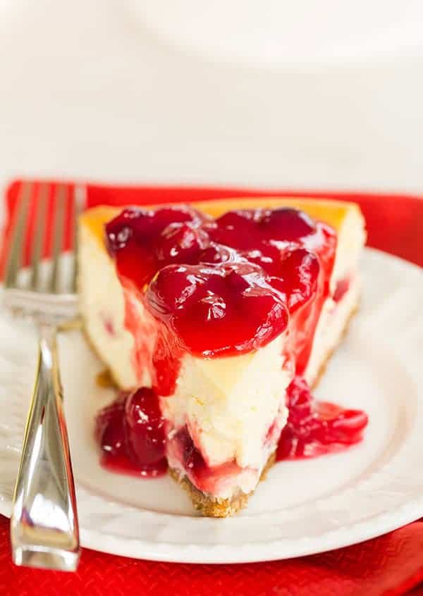 Cranberry-Eggnog Cheesecake - The perfect dessert to take you from Thanksgiving right on through Christmas! | browneyedbaker.com