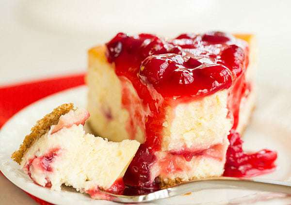 Cranberry-Eggnog Cheesecake - The perfect dessert to take you from Thanksgiving right on through Christmas! | browneyedbaker.com
