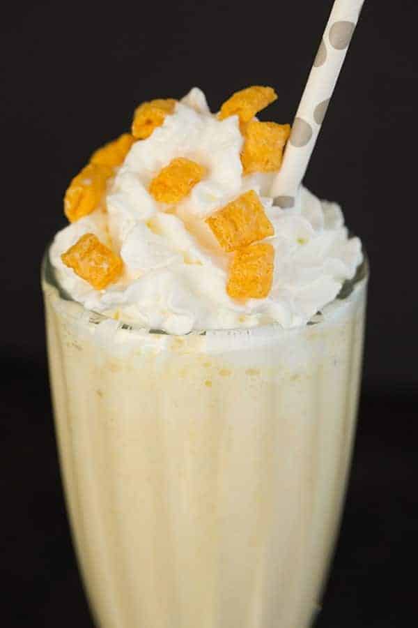 Captain Crunch Milkshake - Cereal-infused milk blended with vanilla ice cream and Captain Crunch cereal. | browneyedbaker.com