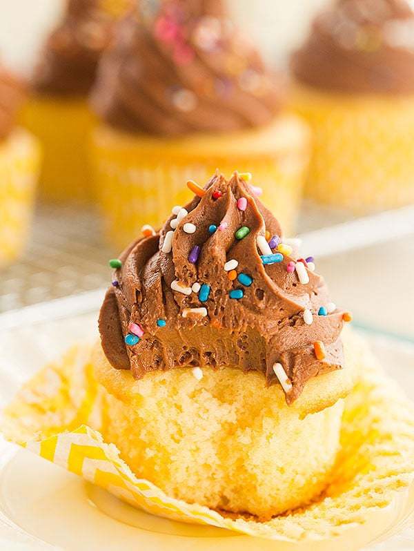 Vanilla Cupcakes with Chocolate Buttercream Frosting - The perfect cupcake for birthdays! | browneyedbaker.com