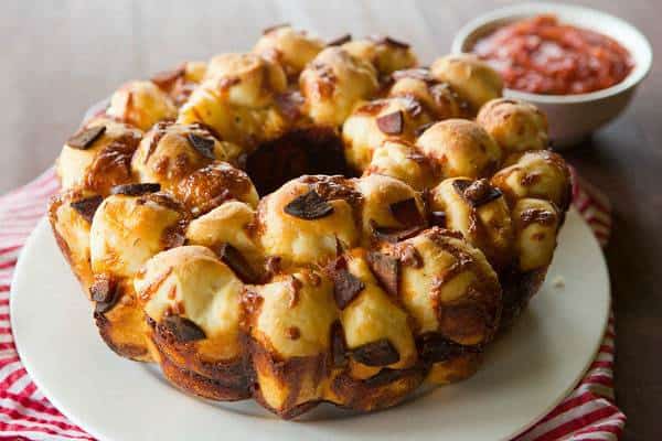 Pepperoni Pizza Monkey Bread with Dipping Sauce | browneyedbaker.com