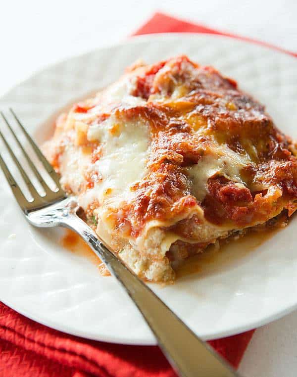 Classic Lasagna Recipe - Layers upon layers of noodles, sauce and lots of cheese! | browneyedbaker.com