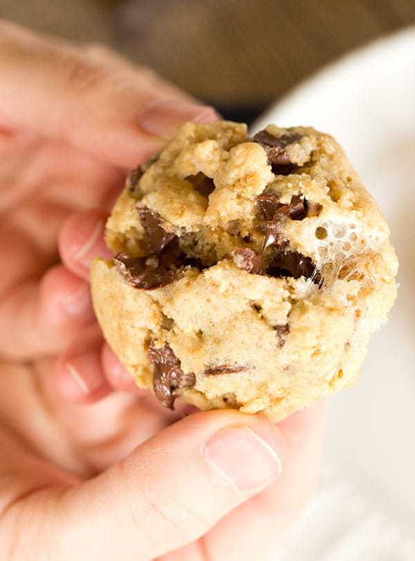 S'mores Cookies made with graham cracker crumbs, mini marshmallows and milk chocolate chips! | browneyedbaker.com