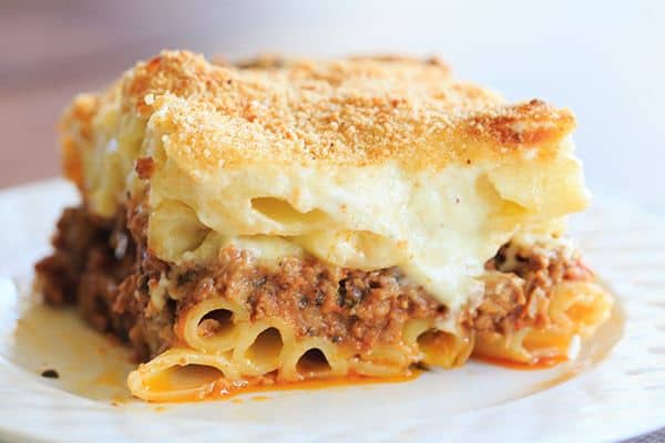 A classic pastitsio recipe - layers of ziti pasta with a beef and lamb sauce, bechamel and loads of cheese! | https://apex-male.info/pastitsio-recipe/