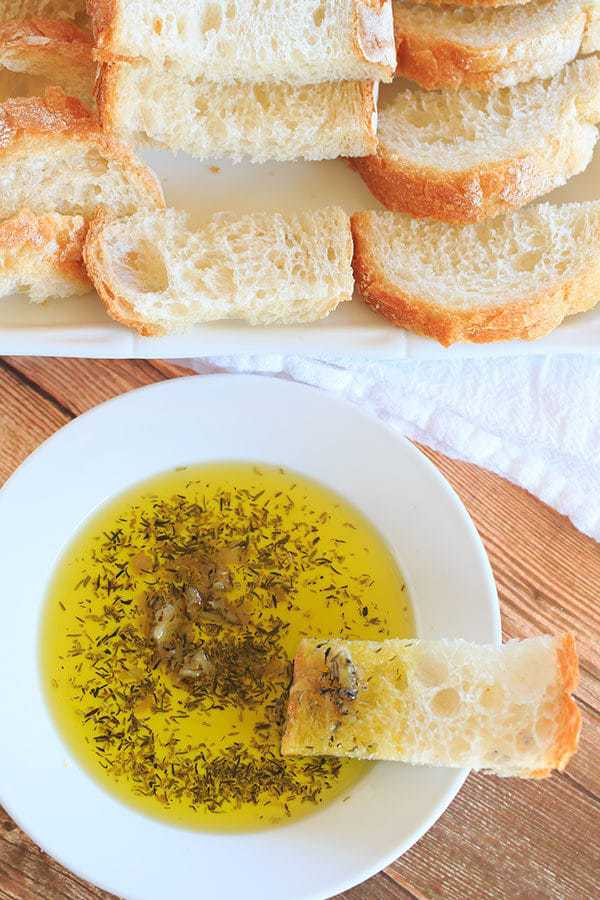 Roasted Garlic & Herb Dipping Oil - Perfect with a loaf of crusty Italian bread! | browneyedbaker.com