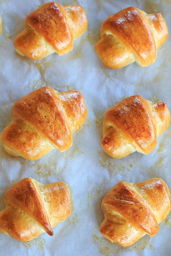 These homemade crescent rolls are flaky, buttery and easier than you'd think. They are the perfect accompaniment to any holiday meal! | https://apex-male.info/homemade-crescent-rolls/