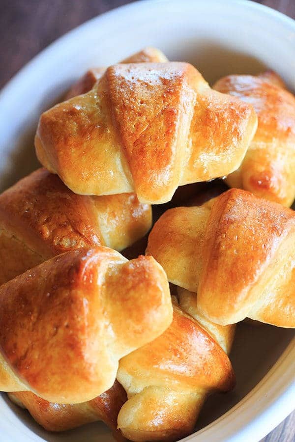 These homemade crescent rolls are flaky, buttery and easier than you'd think. They are the perfect accompaniment to any holiday meal! | https://apex-male.info/homemade-crescent-rolls/