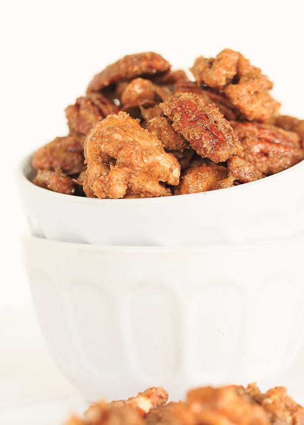 Sugar and Spiced Candied Nuts - These sweet and spicy candied nuts are sweet with a punch of cinnamon and a hint of spice. Perfect for holiday cocktail parties or hostess gifts! | https://apex-male.info/sugar-and-spice-candied-nuts/