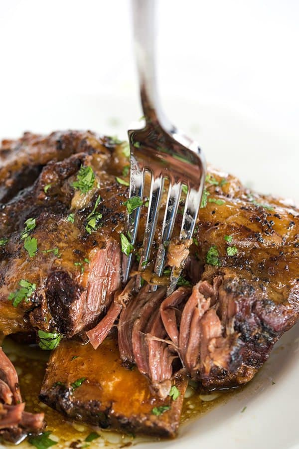 Slow Cooker Korean Short Ribs are an easy, set it and forget it meal that is full of amazing flavor and tender, falling apart meat! | browneyedbaker.com