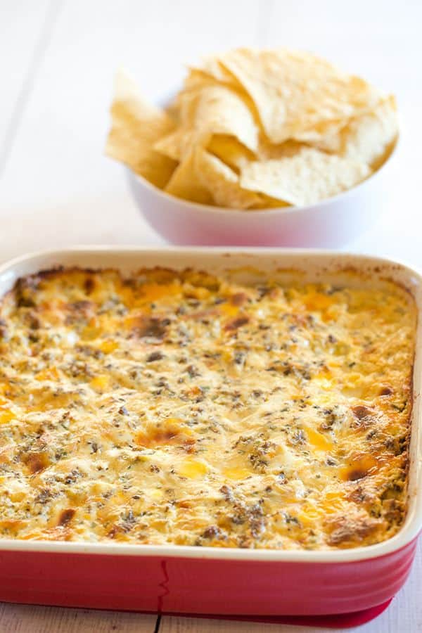 This "Hissy Fit Dip" with the crazy moniker is a HUGE party hit - sausage, cream cheese, sour cream, two cheeses, chives and seasonings make this one absolutely irresistible! | browneyedbaker.com