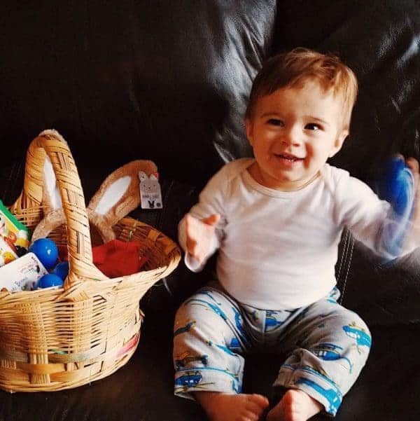 Joseph digging into his Easter basket!
