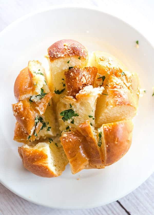 These Easy Pull-Apart Garlic Rolls are quick, a perfect way to use up leftover dinner rolls, and are a fabulous alternative to traditional garlic bread.