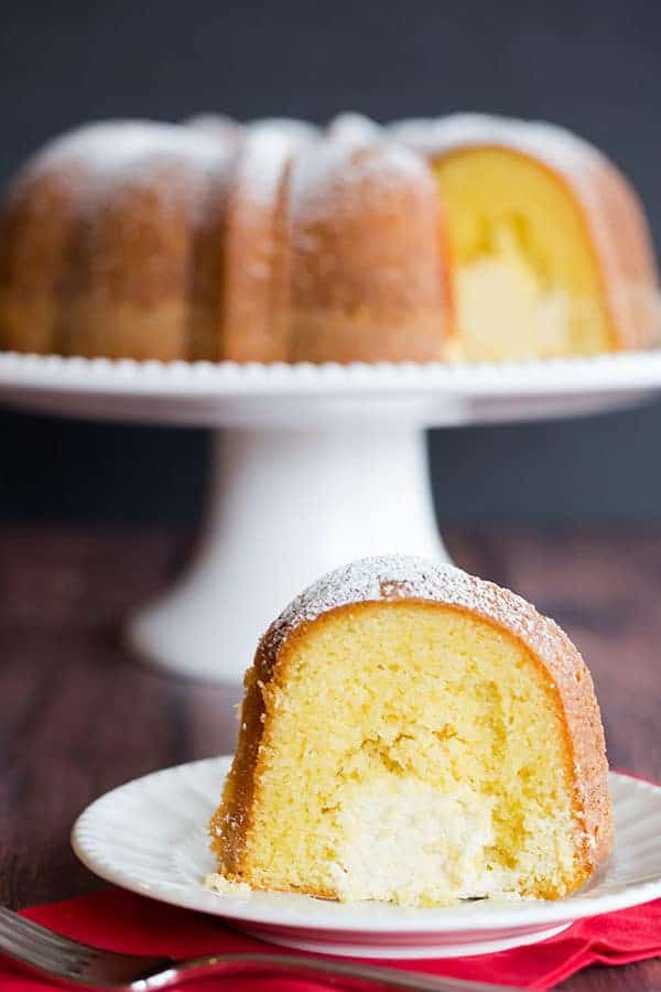 Twinkie Bundt Cake - This homemade Bundt version of the popular Twinkie dessert features a vanilla pound cake with a tunnel of that glorious cream filling!