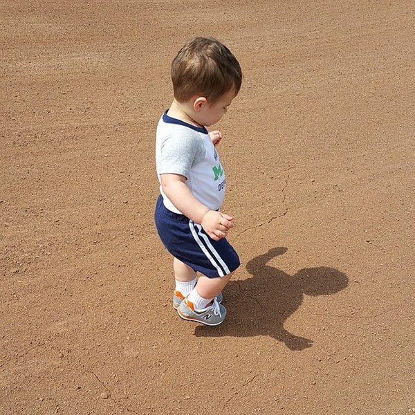 Joseph running around the baseball field