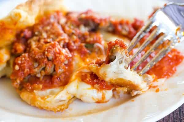 Deep Dish Biscuit Pizza - All of the amazing flavor of a traditional deep dish pizza without a shortcut biscuit crust. Great for a quick pizza night!