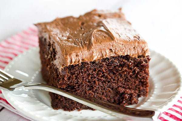 Chocolate Dump-It Cake: An old-fashioned recipe for chocolate cake mixed together in one pot, topped with a tangy cream cheese-chocolate frosting.