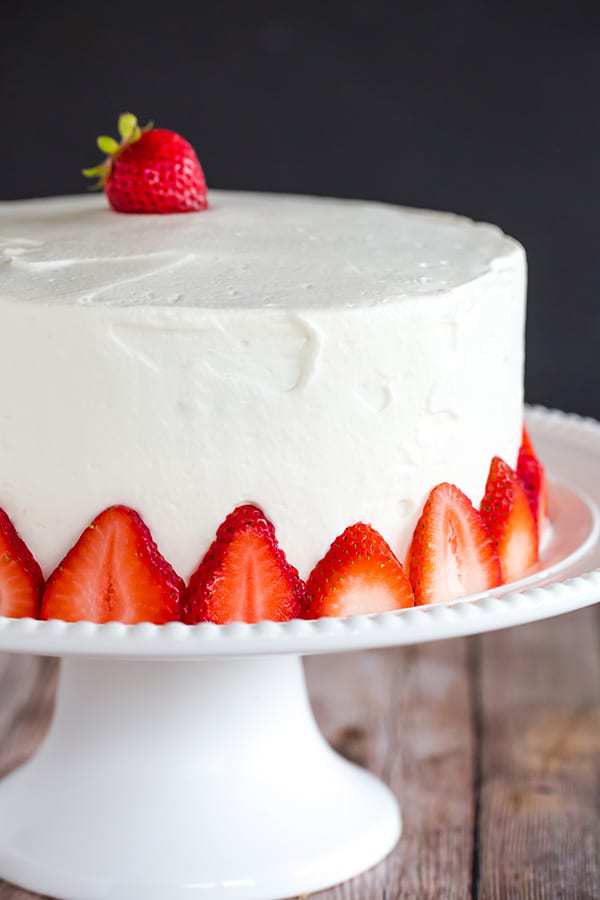 Strawberry Poke Cake - A two-layer beauty with the most amazing fresh sweet whipped cream. A perfect summer celebration cake!