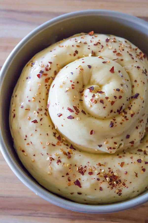 Spicy Cheese Bread - This recipe makes a huge loaf of a rich brioche-like bread loaded with provolone and Monterey Jack cheeses, and speckled with crushed red pepper flakes. | browneyedbaker.com