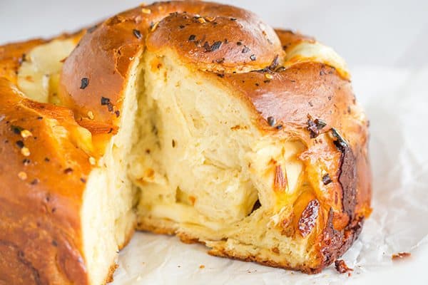 Spicy Cheese Bread - This recipe makes a huge loaf of a rich brioche-like bread loaded with provolone and Monterey Jack cheeses, and speckled with crushed red pepper flakes. | browneyedbaker.com