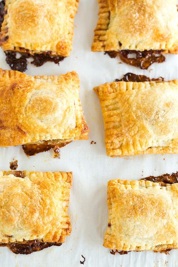 Banoffee Tartlets: A quick and easy dessert using puff pastry filled with chocolate, bananas and dulce de leche. All of the flavors of a banoffee pie without all of the work!