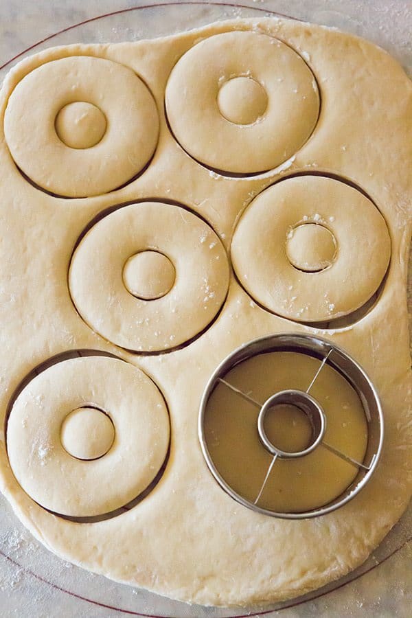 A copycat recipe for Krispy Kreme doughnuts - they're light, airy and covered in a barely-there glaze.