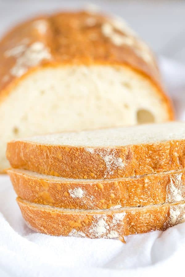 This Italian bread recipe takes some time to come together, but the hard crust and chewy bread are 100% worth it. Totally necessary with a bowl of pasta or a hearty soup!