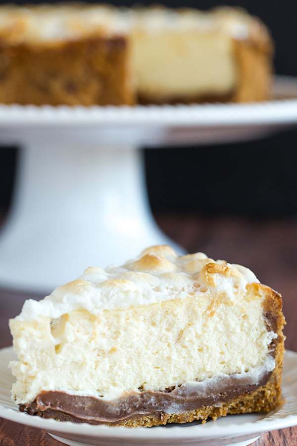 S'mores Cheesecake - The ultimate summer dessert! Graham cracker crust, chocolate fudge, and marshmallow cheesecake, all topped with toasted marshmallows.
