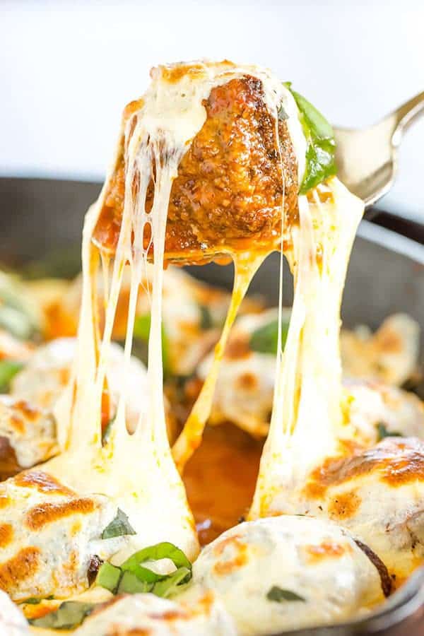 Skillet Meatball Parmesan: An easy skillet meal with awesome meatballs simmered in a tomato sauce and topped with lots of fresh mozzarella.