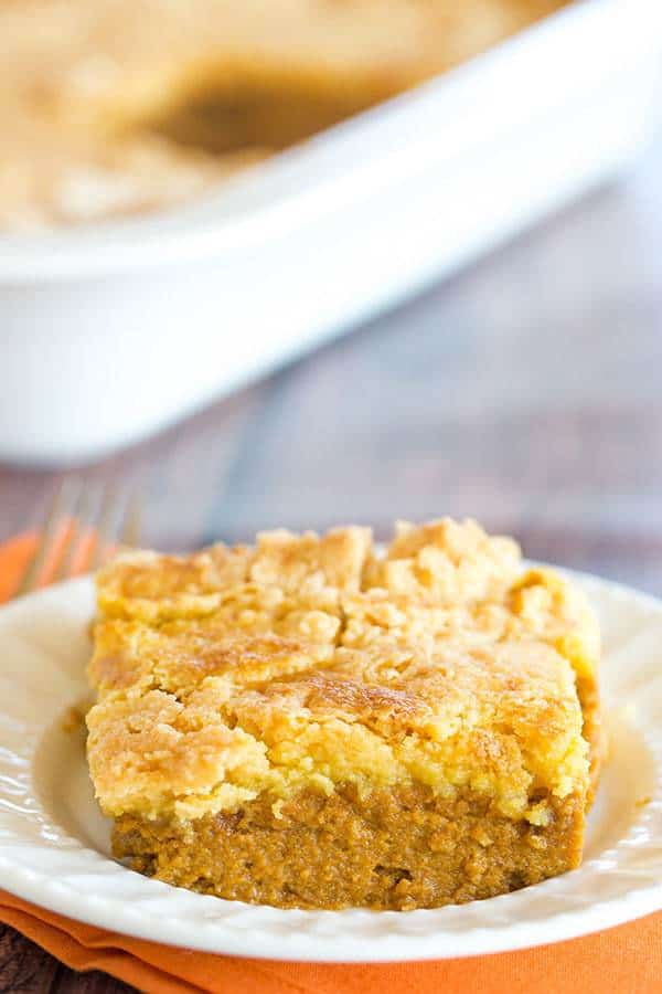 Pumpkin Yummy Dessert is made like a dump cake, with a pumpkin pie layer topped with a buttery cake layer. A quick and easy Thanksgiving dessert!