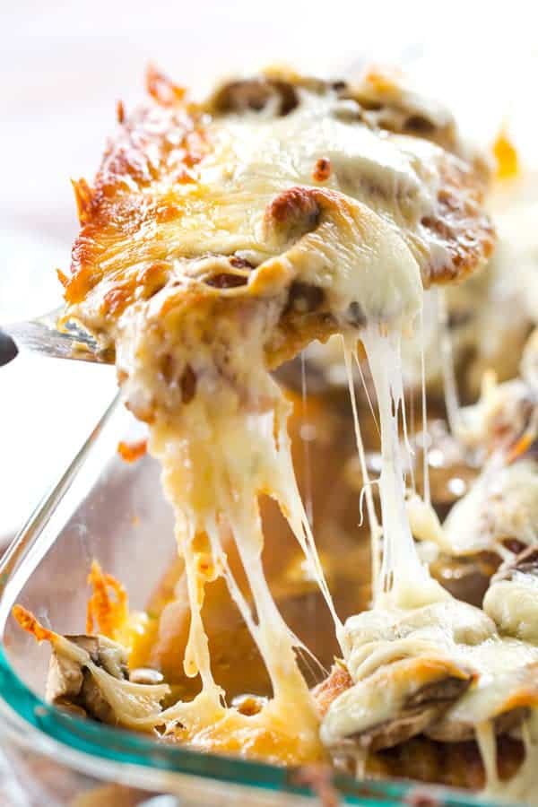 Cheesy Chicken with Mushrooms - Breaded chicken cutlets layered with sliced mushrooms and mozzarella. Easy dinner! | browneyedbaker.com