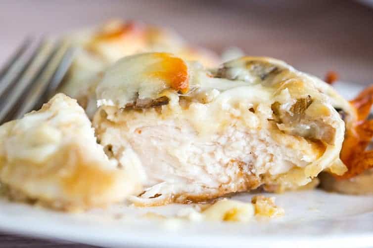 Cheesy Chicken with Mushrooms - Breaded chicken cutlets layered with sliced mushrooms and mozzarella. Easy dinner! | browneyedbaker.com