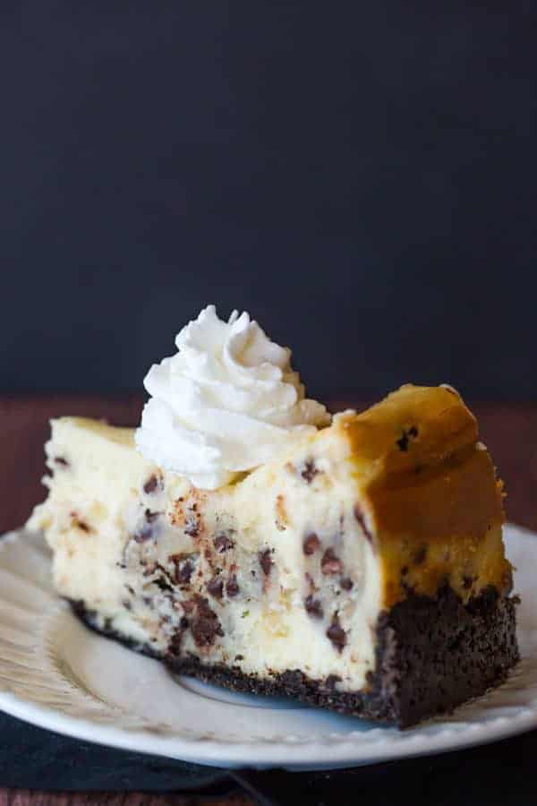 The best cheesecake recipe loaded with chunks of chocolate chip cookie dough and mini chocolate chips - a cookie dough lover's dream!
