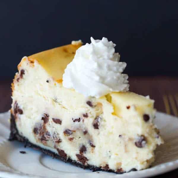 The best cheesecake recipe loaded with chunks of chocolate chip cookie dough and mini chocolate chips - a cookie dough lover's dream!