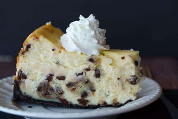 The best cheesecake recipe loaded with chunks of chocolate chip cookie dough and mini chocolate chips - a cookie dough lover's dream!