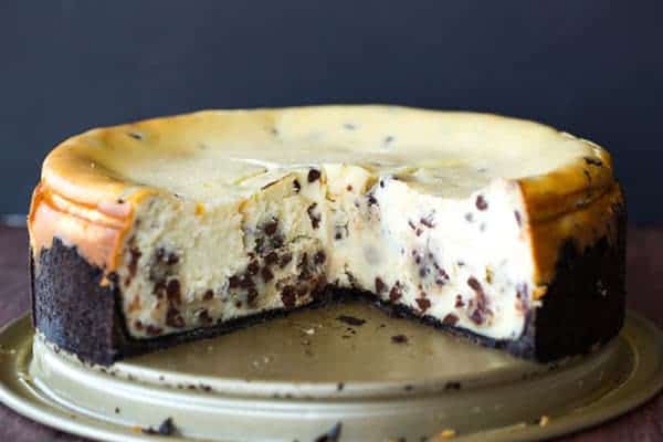The best cheesecake recipe loaded with chunks of chocolate chip cookie dough and mini chocolate chips - a cookie dough lover's dream!