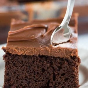 This fabulous chocolate sheet cake only requires one pot for mixing and is topped with the most amazing milk chocolate ganache frosting.