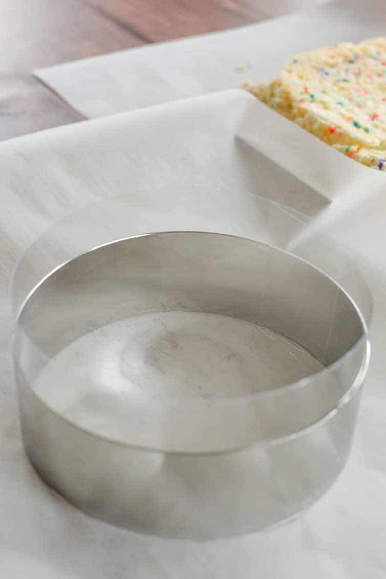 The famous Momofuku Milk Bar Birthday Layer Cake - Layers of funfetti cake loaded with sprinkles, vanilla frosting, and birthday cake crumbs!