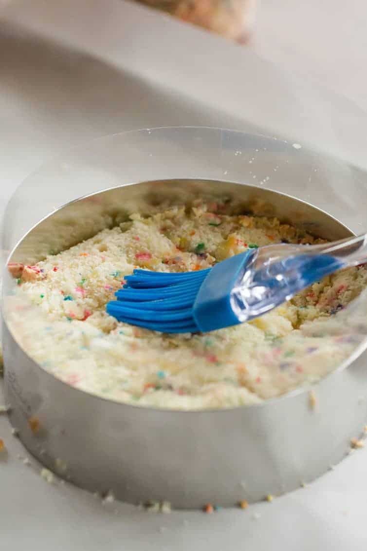 The famous Momofuku Milk Bar Birthday Layer Cake - Layers of funfetti cake loaded with sprinkles, vanilla frosting, and birthday cake crumbs!