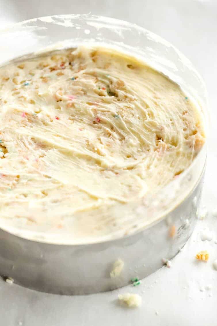 The famous Momofuku Milk Bar Birthday Layer Cake - Layers of funfetti cake loaded with sprinkles, vanilla frosting, and birthday cake crumbs!