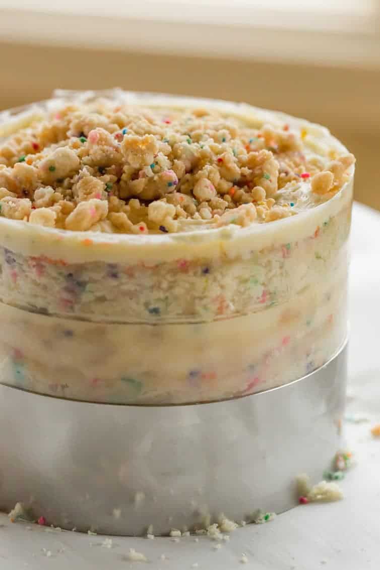 The famous Momofuku Milk Bar Birthday Layer Cake - Layers of funfetti cake loaded with sprinkles, vanilla frosting, and birthday cake crumbs!