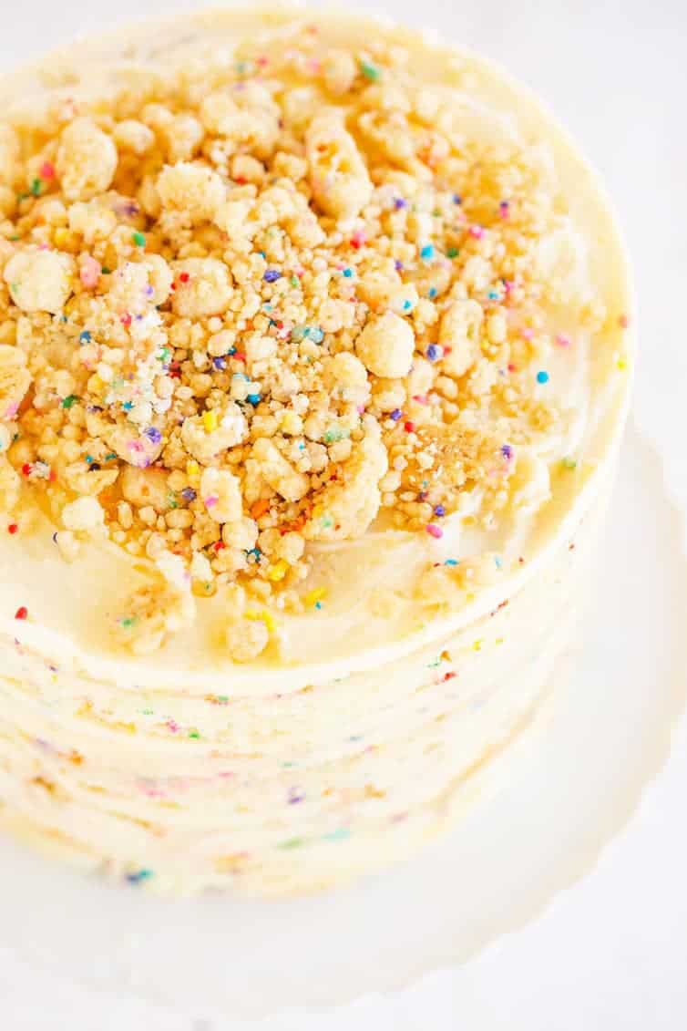 The famous Momofuku Milk Bar Birthday Layer Cake - Layers of funfetti cake loaded with sprinkles, vanilla frosting, and birthday cake crumbs!