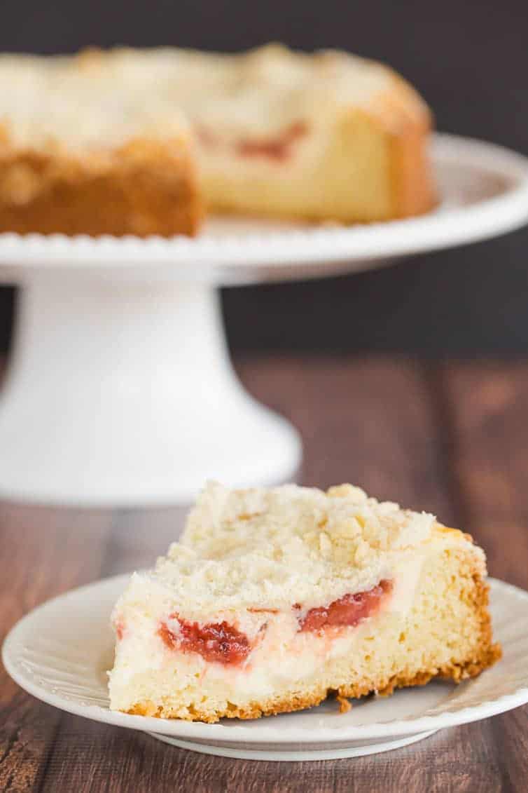 Strawberry Rhubarb Coffee Cake - A biscuit-like cake topped with a cream cheese filling and homemade strawberry rhubarb jam.