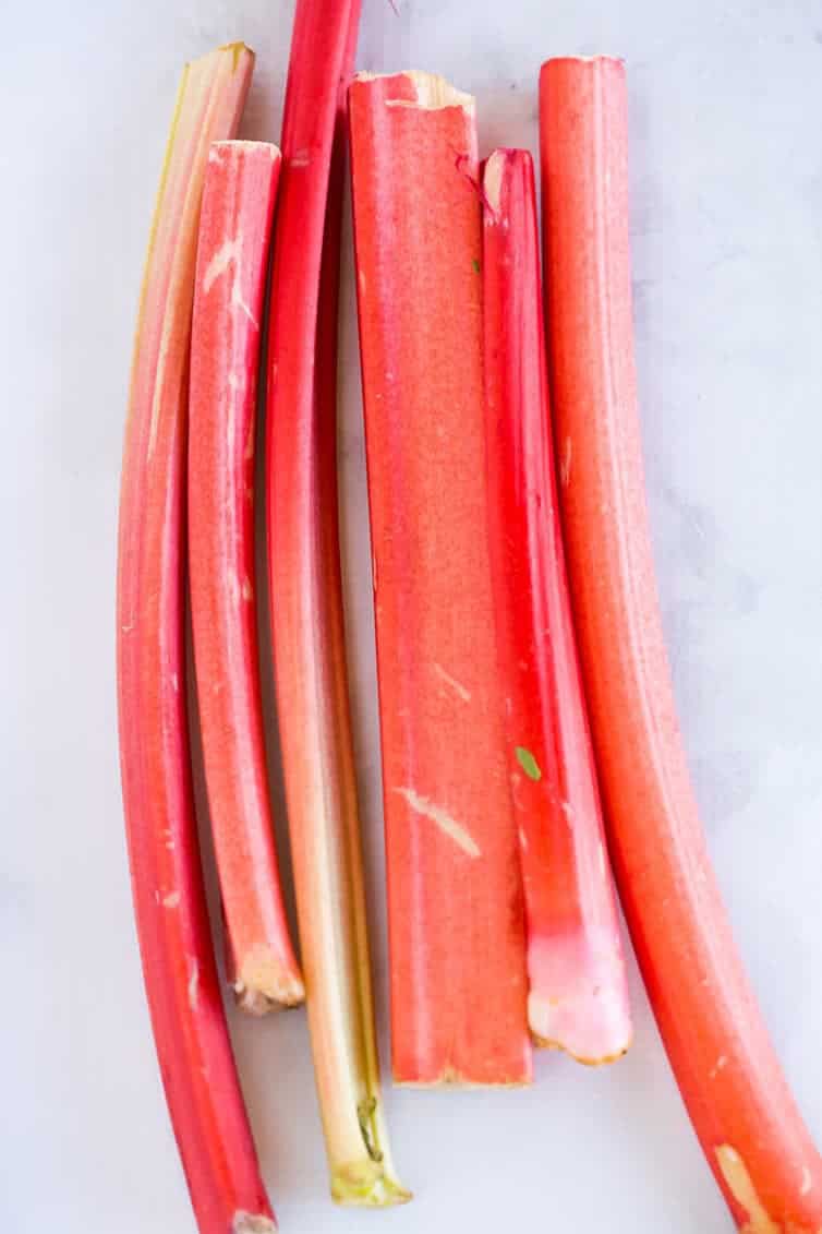 Strawberry Rhubarb Coffee Cake - A biscuit-like cake topped with a cream cheese filling and homemade strawberry rhubarb jam.