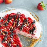 A strawberry-vanilla ice cream pie with a sugar cone and pretzel crust.