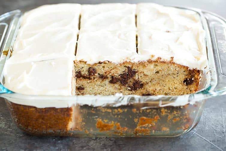 A pan of Banana-Chocolate Chip Snack Cake with Cream Cheese Frosting