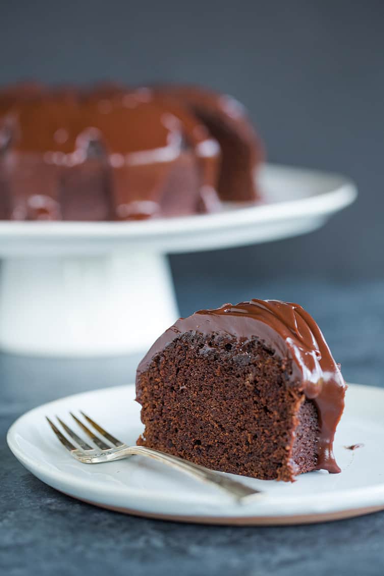 A single slice of Grammy Cake with chocolate ganache glaze.