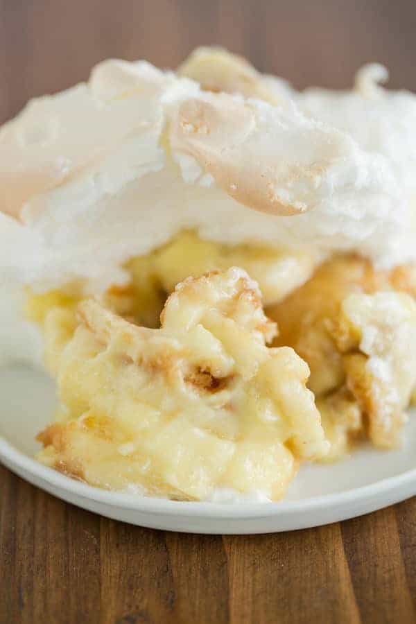 Southern Banana Pudding with layers of Nilla wafers, sliced bananas, homemade vanilla pudding, and meringue.