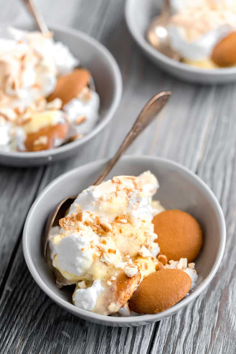 Banana pudding in three individual serving bowls.