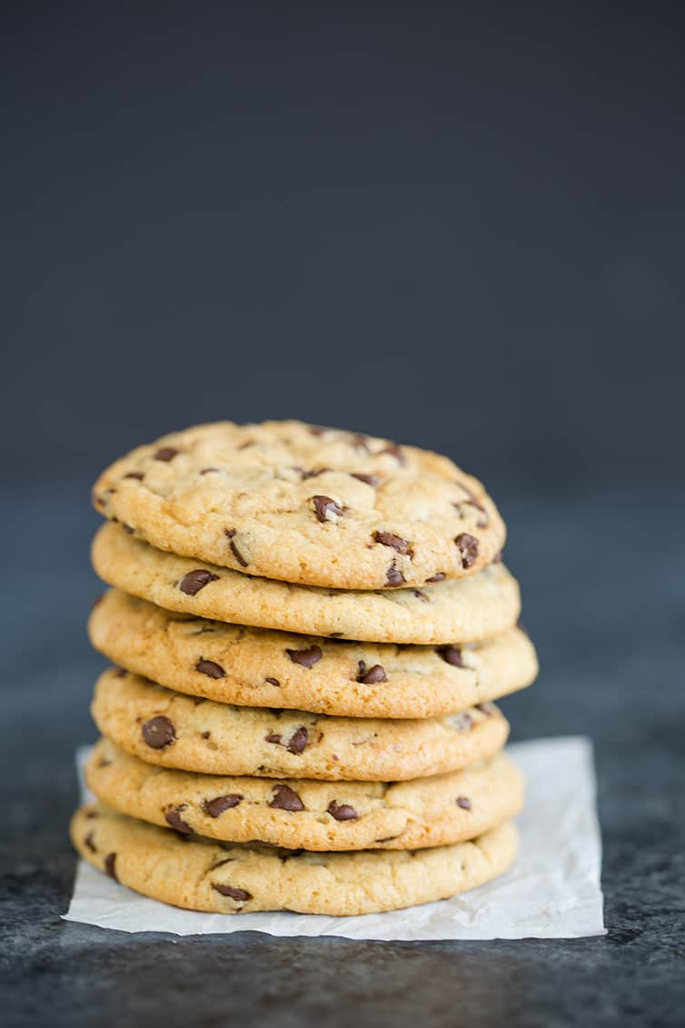 So many soft and chewy chocolate chip cookies in a big stack!