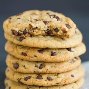 A big stack of soft and chewy chocolate chip cookies.